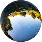 Glass sphere reflecting a world